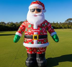 C1-422 Papai Noel inflável usando marca da moda e óculos de sol