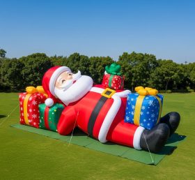 C1-467 Papai Noel inflável deitado dentro de um presente