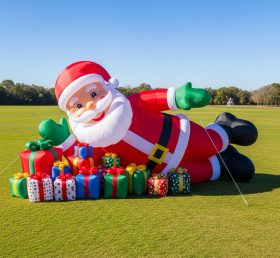 C1-474 Papai Noel inflável deitado dentro de um presente